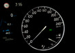 Side view of modern car dashboard with circular speedometer, fuel gauge indicator, odometer, trip distance, fuel range and parking lights icon. Close up of petrol level showing on car instrument panel