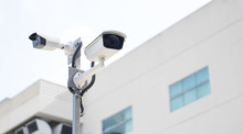 CCTV Surveillance Security Camera Video Equipment On Pole Outdoor Building Safety System Area Control And Copy Space