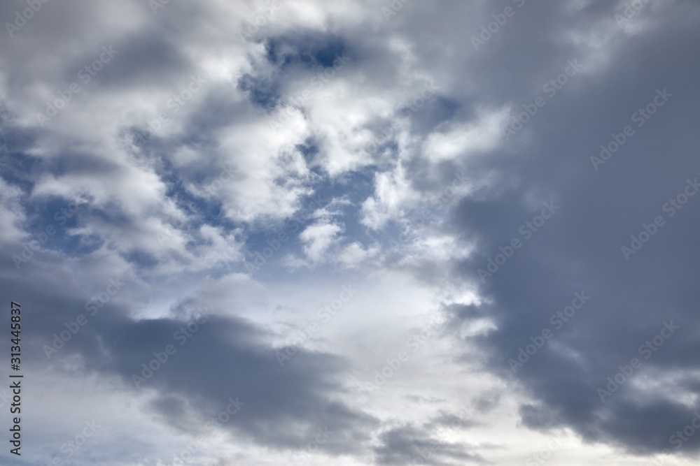 Stormy clouds in the blue sky - obrazy, fototapety, plakaty 