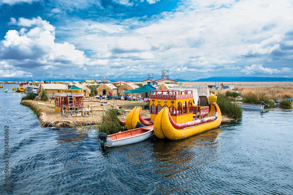 Uros floating islands on Titicaca lake in Puno, Peru, South America. - obrazy, fototapety, plakaty 