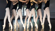 © Haydiddle - Group of seven ballet dancers in dance studio practicing as a team