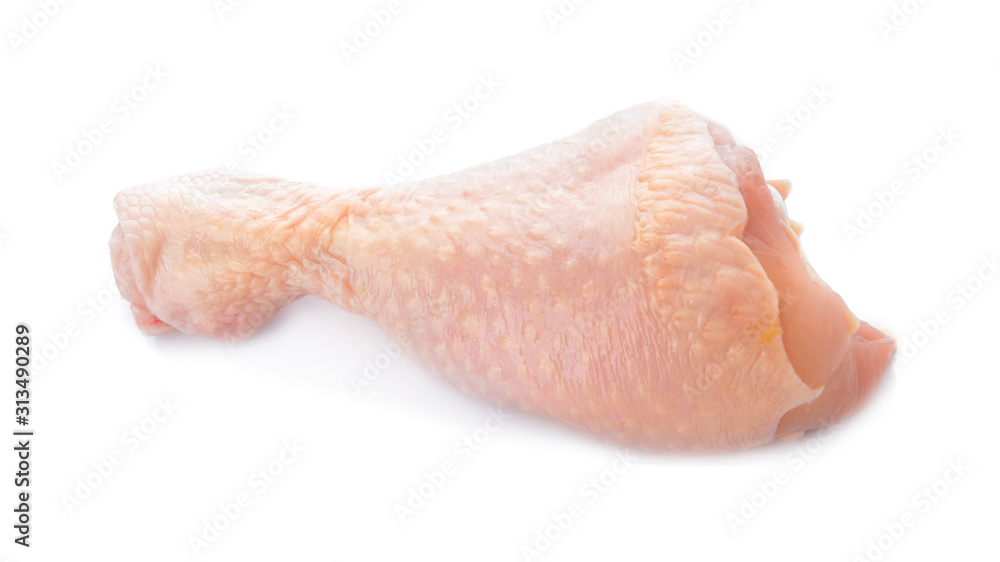 Raw chicken drumstick on white background