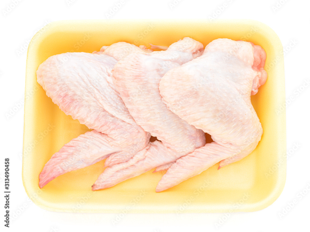 Raw chicken wings on white background