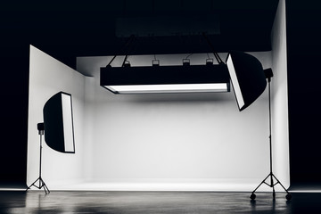 Modern photo studio with professional lighting equipment