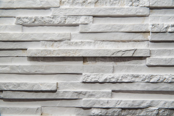 Wall Mural - White brick texture. Plaster white brick, composition on the wall.