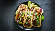 Mexican Street Tacos Flat Lay Composition With Pork Carnitas, Avocado, Onion, Cilantro, And Red Cabbage