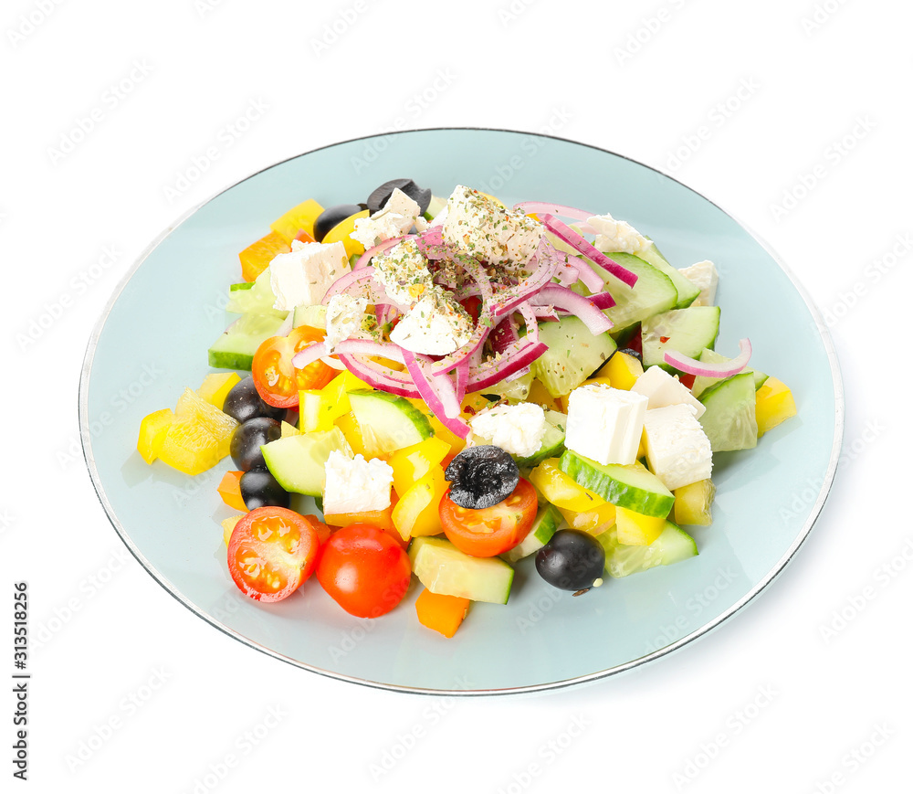 Plate with fresh Greek salad on white background