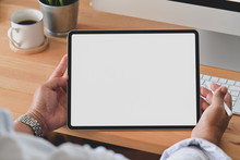 Cropped Shot Of Young Man Holding Blank Screen Digital Tablet