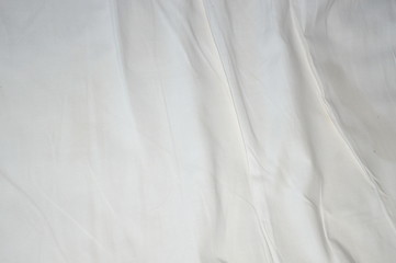 Canvas Print - The surface of the bed sheet is crumpled.