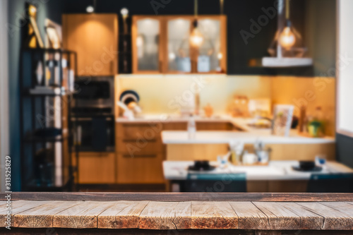 Photographie Wood table with blur kitchen room background
