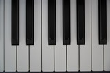 Electric piano keyboard background with close-up focus	