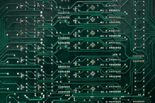 Close Up - The Tracks On The Green Motherboard