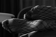 © beauty_objects - woman feet close-up, fishnet stockings, black and white
