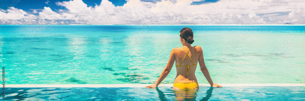 Hotel swimming pool luxury travel vacation summer holiday panoramic banner background with woman in bikini enjoyin sun tan swim lifestyle. - obrazy, fototapety, plakaty 