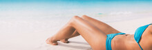 Summer Beach Bikini Body Woman Lying On White Sand Sun Tanning Smooth Legs Sun Tan For Laser Hair Removal Concept Banner Panoramic Background.