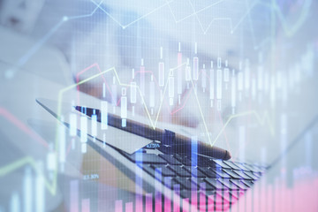 Fototapete - Forex graph hologram on table with computer background. Multi exposure. Concept of financial markets.