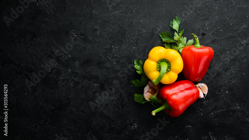 fresh-bell-pepper-on-a-black-stone-background-top-view-free-space-for-your-text