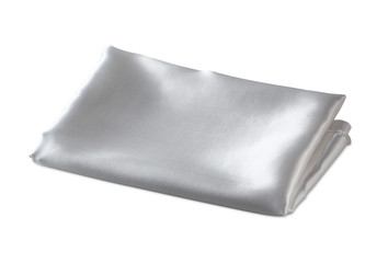 folded piece of white satin fabric isolated on white background