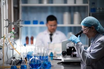 Wall Mural - health care researchers working in life science laboratory