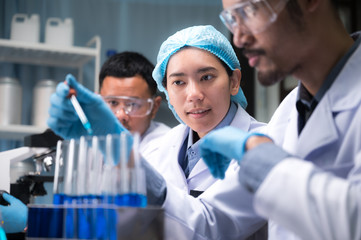 Wall Mural - health care researchers working in life science laboratory