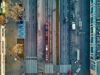 Wall Mural - Beautiful panoramic aerial drone view - a look down at the avenue of John Paul II in Warsaw, Poland- amazing January sunset