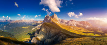 Panorama on Seceda with birds flying over the peaks. Trentino Alto Adige, Dolomites Alps, South Tyrol, Italy. Val Gardena. Majestic Furchetta peak. Odles group seen from Seceda, Val Gardena.