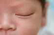 © sutichak - close up eye of cute newborn baby sleeping sweet dream