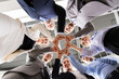 © Syda Productions - corporate, people and teamwork concept - happy business team making fist bump at office from below