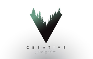 Wall Mural - creative v letter logo idea with pine forest trees. letter v design with pine tree on top
