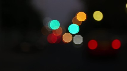 Wall Mural - defocused lights of traffic on a city road at night