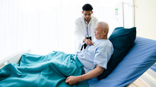 Senior Asian Patients Lying Hospital Bed, Receiving Medical Treatment From Specialist Doctor. Physical Examination Such As Respiratory System, Heartbeat, Diabetes And Pressure. Concept Life Insurance