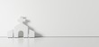 © Destrosvet - 3D rendering of white symbol of church icon leaning on color wall with floor reflection with empty space on right side