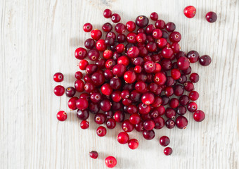 Poster - fresh cranberries on white wooden surface