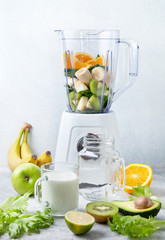 Poster - blender with sliced fruits and vegetables