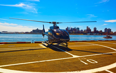 Wall Mural - Helicopter landing at helipad. Skyline with Skyscrapers in Brooklyn Manhattan, New York City, America USA. American architecture building. Metropolis NYC. Cityscape. Hudson, East River NY