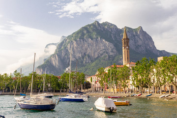 view on the bay of lake Como, historical city center and admire the main attractions of the city St. Nicholas di Campanile, San Nicol and Basilica of St Nicolo. lombardy, village lecco, Italy, Europe