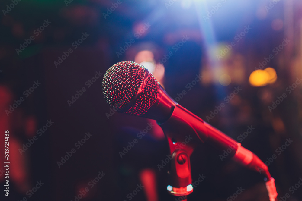 Close up of microphone in concert hall or conference room. - obrazy, fototapety, plakaty 