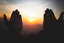 Silhouette Of Christian Man Hands Praying To God, Man Pray For God Blessing To Wishing Have A Better Life. Begging For Forgiveness And Believe In Goodness, Christian Religion Concept Background.