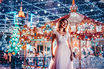 Christmas photoshoot beautiful woman with snow