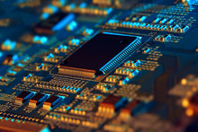 Electronic Circuit Board With Electronic Components Such As Chips Close Up. The Concept Of The Electronic Computer Hardware Technology.	