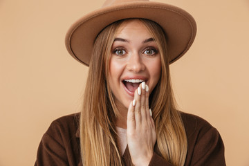 Sticker - Image of young caucasian girl wearing hat and coat expressing wonder