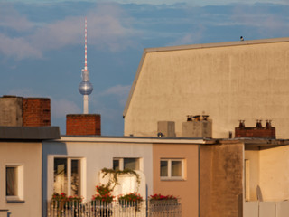 Berlin Televison Tower behind some tenement buildings