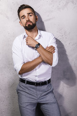 Wall Mural - Portrait of handsome bearded man wearing white shirt