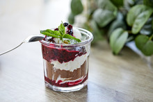 dessert with chocolate and berries in the glass