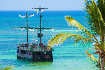 Poster - Pirate ship on the coast of Caribbean island, Punta Cana, Dominican Republic