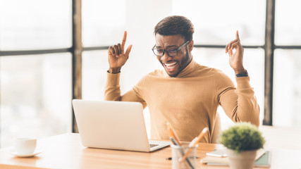 Ecstatic afro guy found new good idea