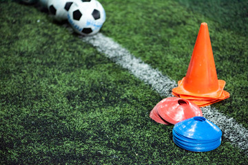 Soccer training equipments on field.