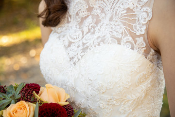 Wall Mural - Détail de la robe de la mariée le jour du mariage