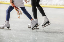 Ice Skaters In Motion