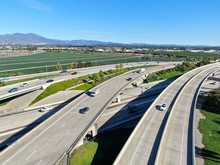 Aerial View Of Highway Transportation With Small Traffic, Highway Interchange And Junction, San Diego Freeway And Santa Ana Freeway. USU California